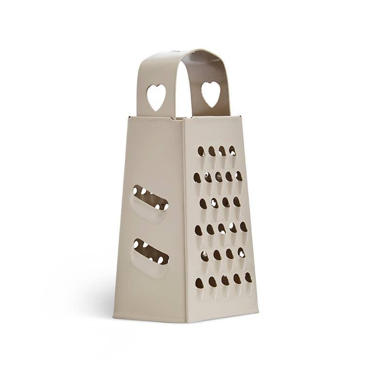 Beige Minireibe für Duftsteine vor weißem Hintergrund